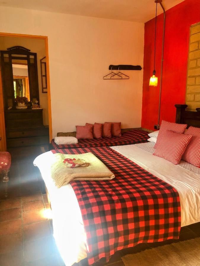 Los Vitrales con la cama doble y la cama sencilla